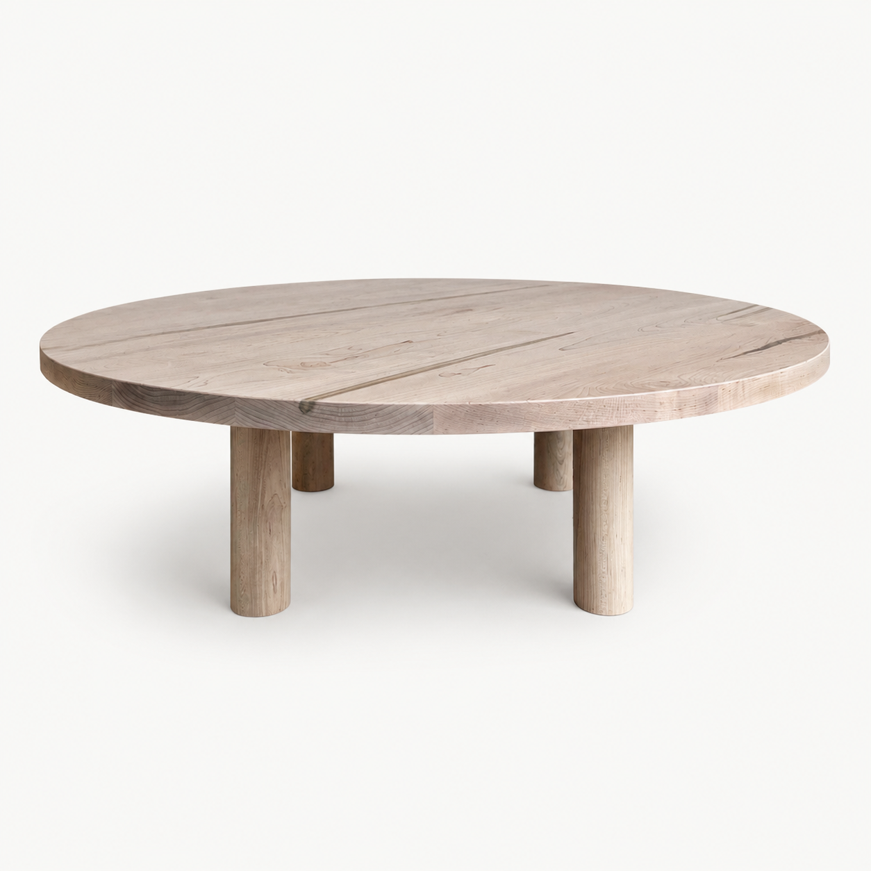 Round Maple Coffee Table on a neutral background