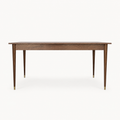 Watson Walnut Dining Table on a neutral background