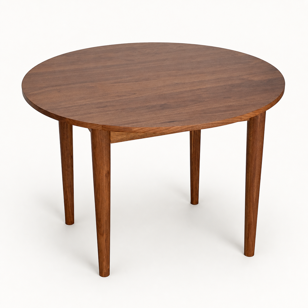 Watson Round Walnut Dining Table on a neutral background
