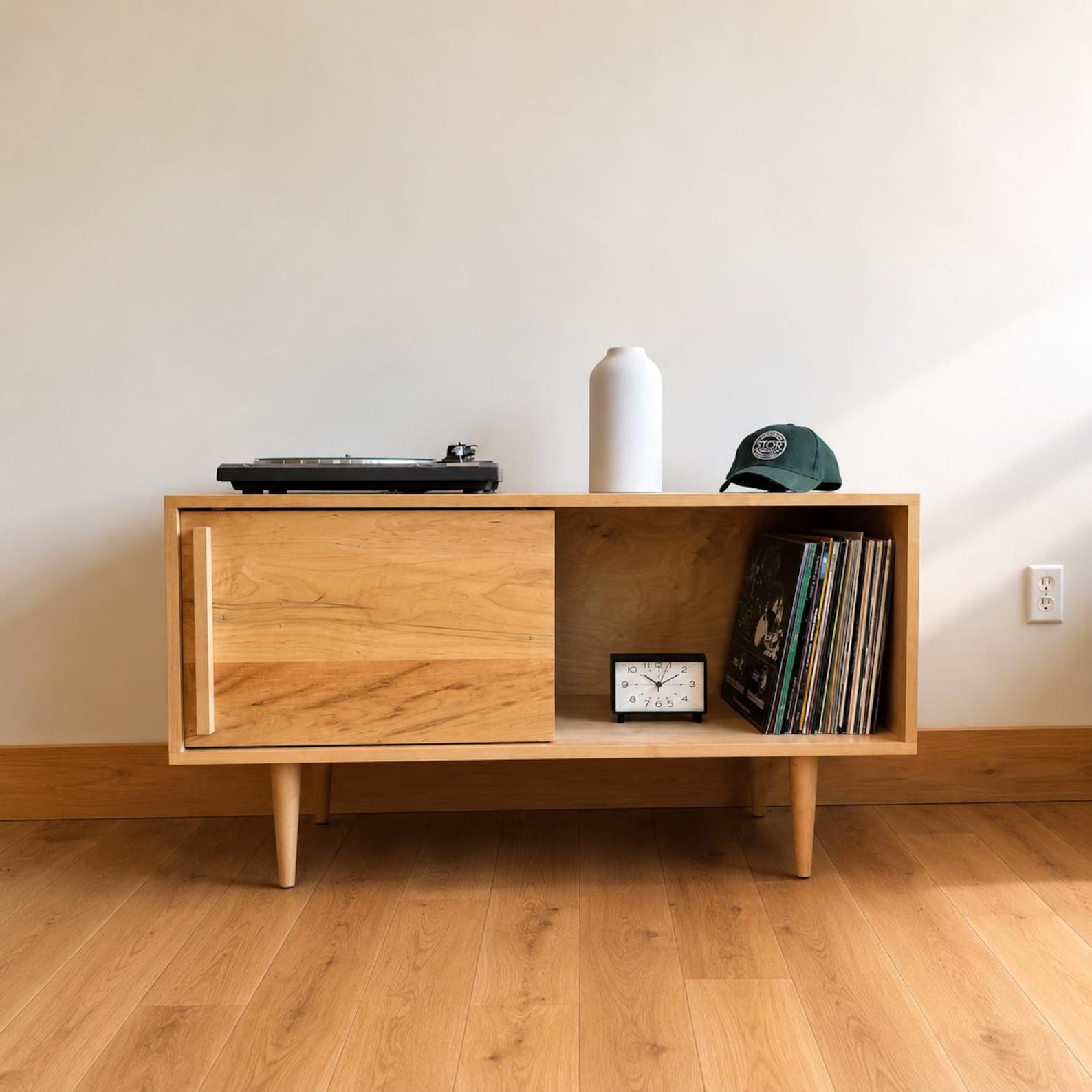Maple media console styled in a warm interior